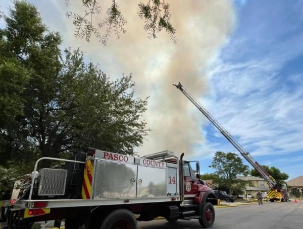 Pasco County Fire Rescue Battling Large Brush Fire Near Anclote High School