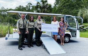 The St. Joe Community Foundation Provides Accessible  Electric Tram at Topsail Hill Preserve State Park