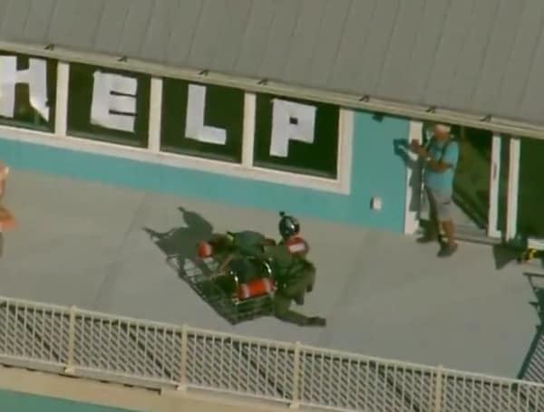 Stranded Person In Sanibel Island, Florida Puts “HELP” On Windows To Gain Attention Of Rescue Workers
