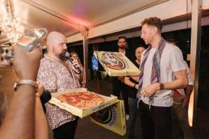 Hungry Howie’s Pizza Makes History: 2 Pizzas Sell for 10,000 Bitcoin at a Miami PizzaArt Event